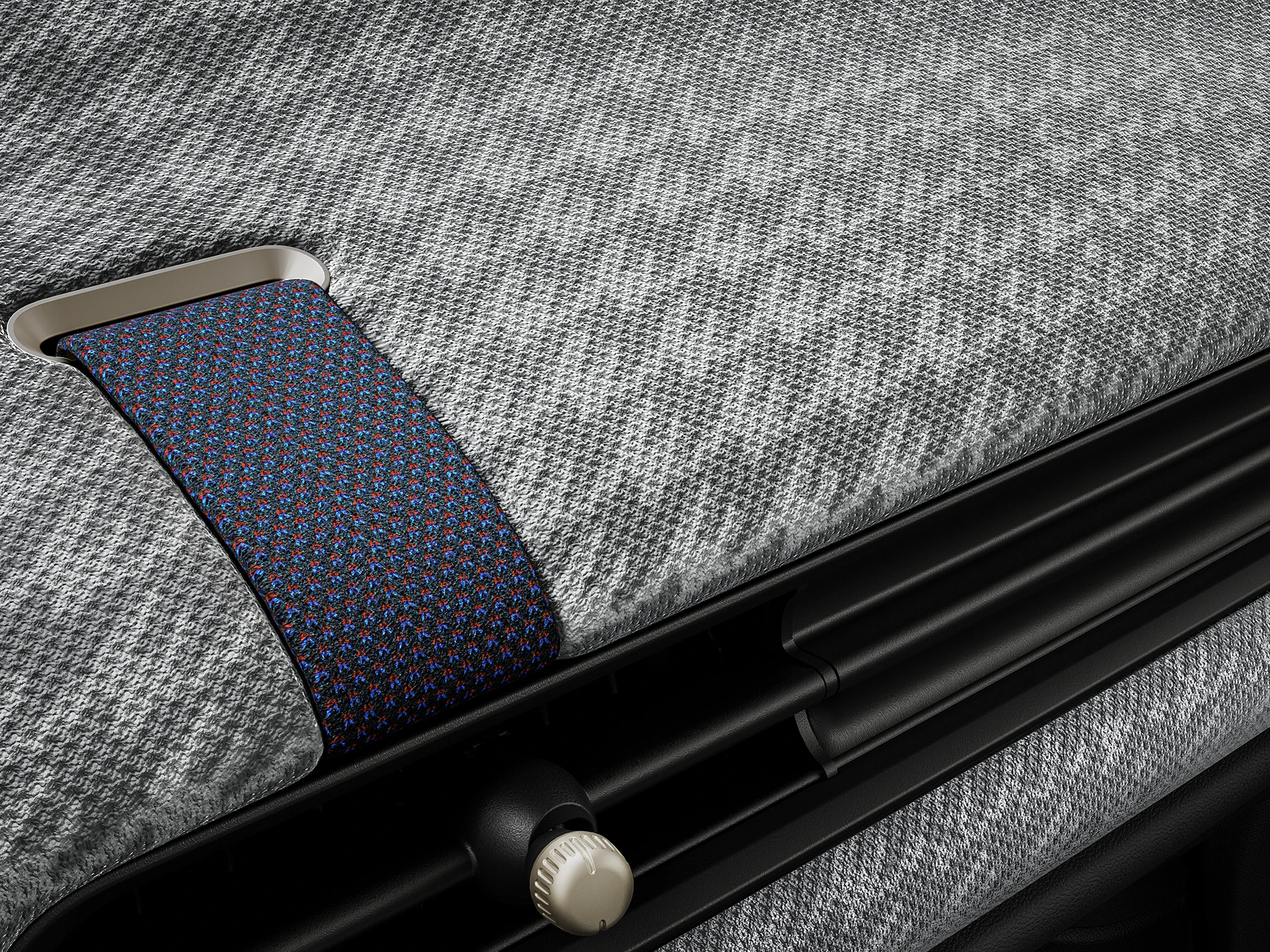 Close-up van het 2D-geweven dashboard aan de binnenkant van de MINI Cooper.