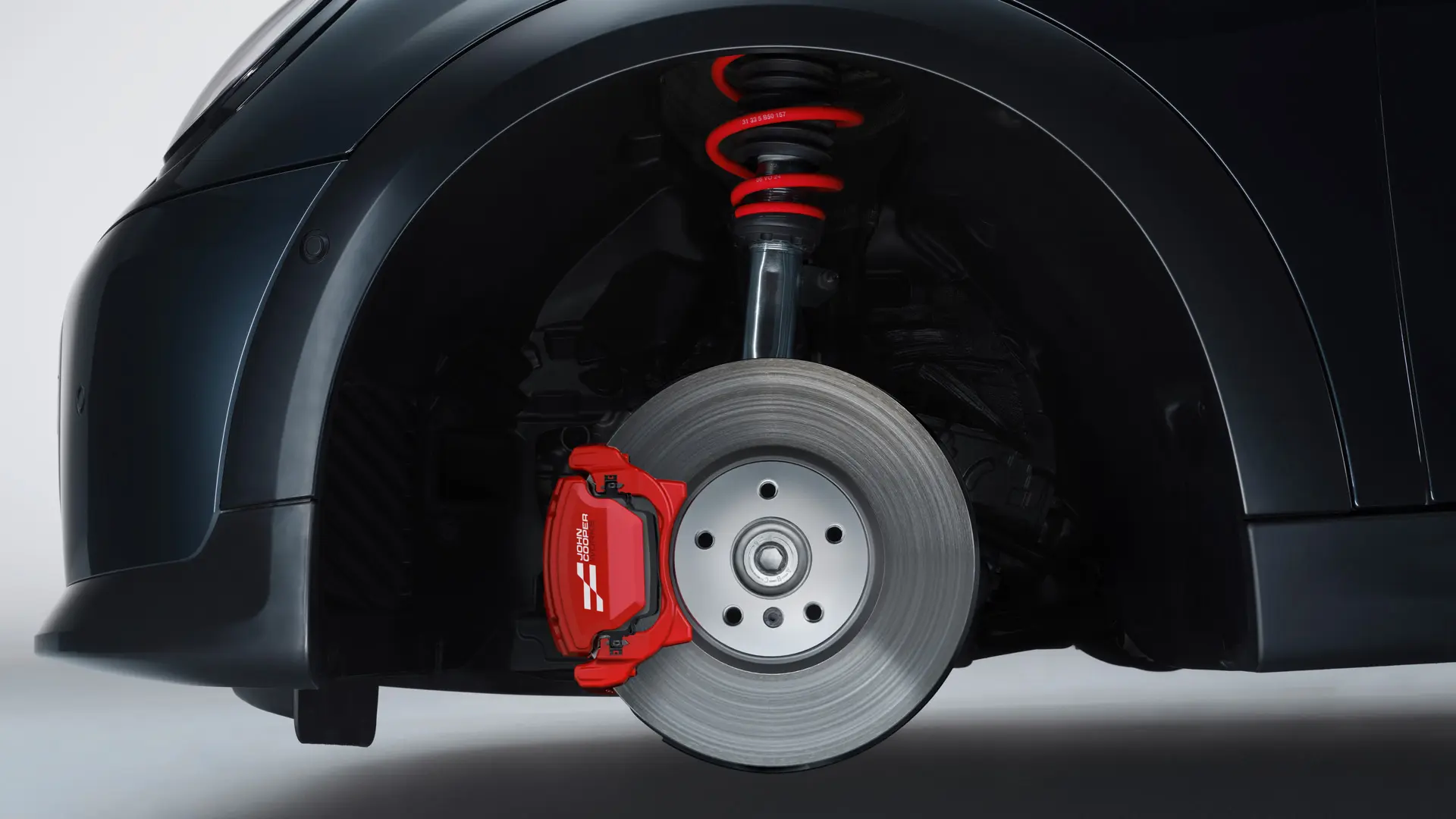 Suspension sport MINI John Cooper Works avec ressorts en Chili Red John Cooper Works.