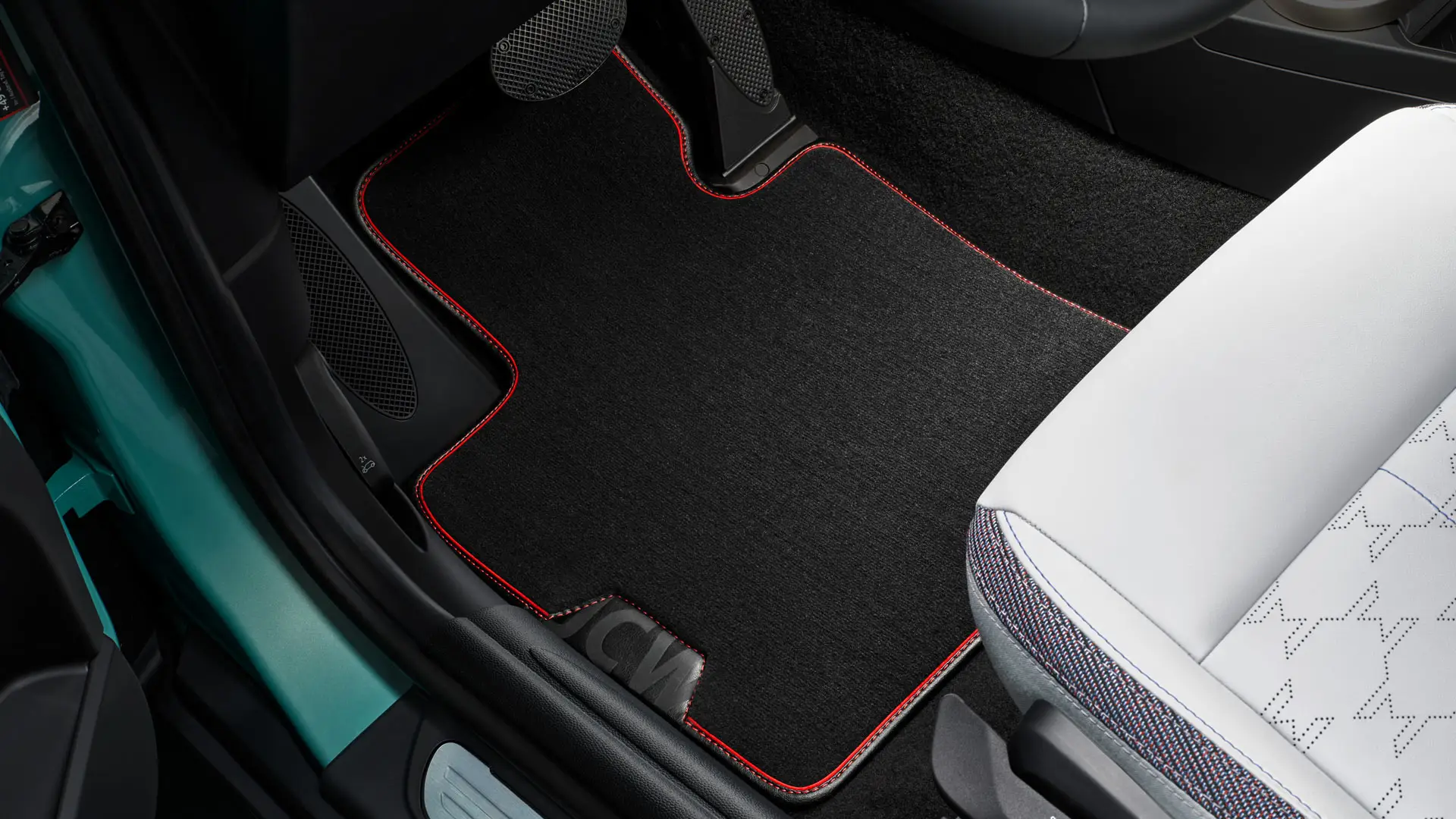 Tapis de sol textile MINI John Cooper Works dans l’espace aux pieds.