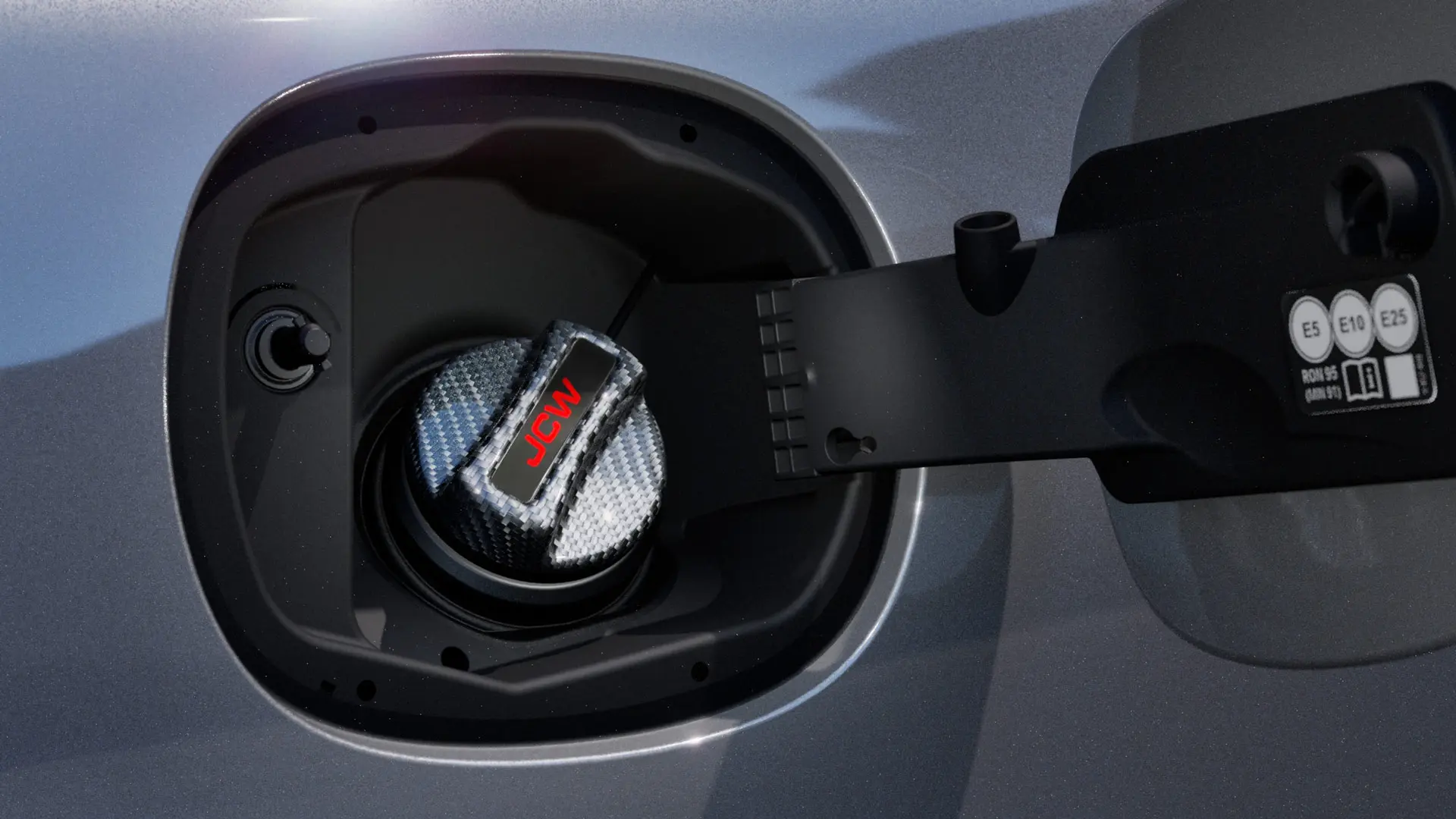 Bouchon de réservoir en carbone MINI John Cooper Works avec inscription JCW.