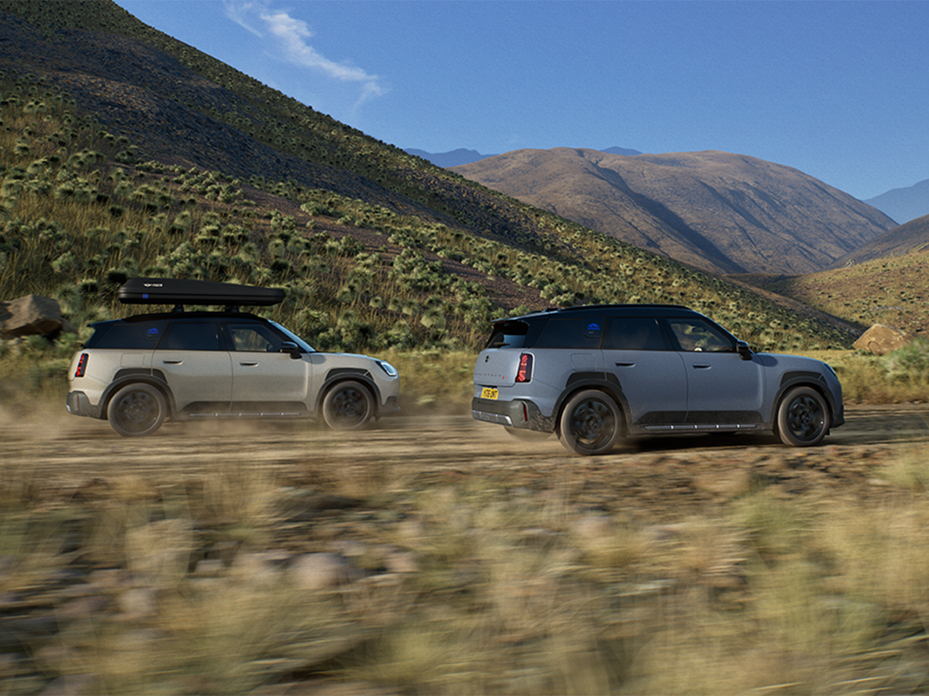 Photo de deux MINI Countryman Untamed Edition, vus de l'arrière.